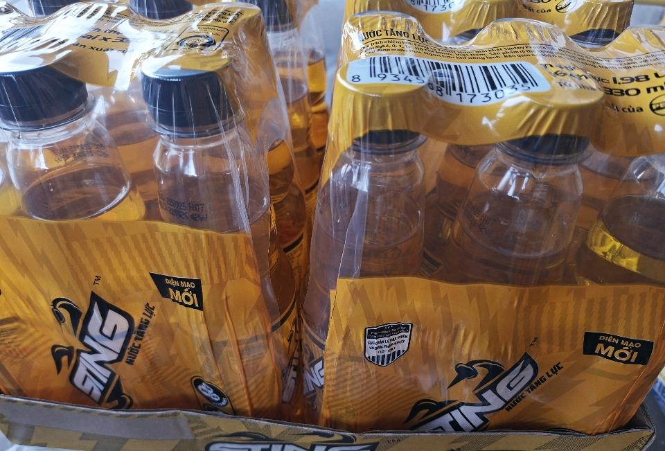 NU Nước Tăng Lực Sting (Vàng B3,B6,B12) Chai 330ml _ Suntory PepsiCo-duoc-ban-tai-Tạp Hóa Candy House's _ NPK