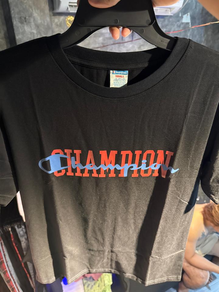 Tee champion đen chữ đỏ xanh-duoc-ban-tai-Bent Luxury Thủ Dầu Một
