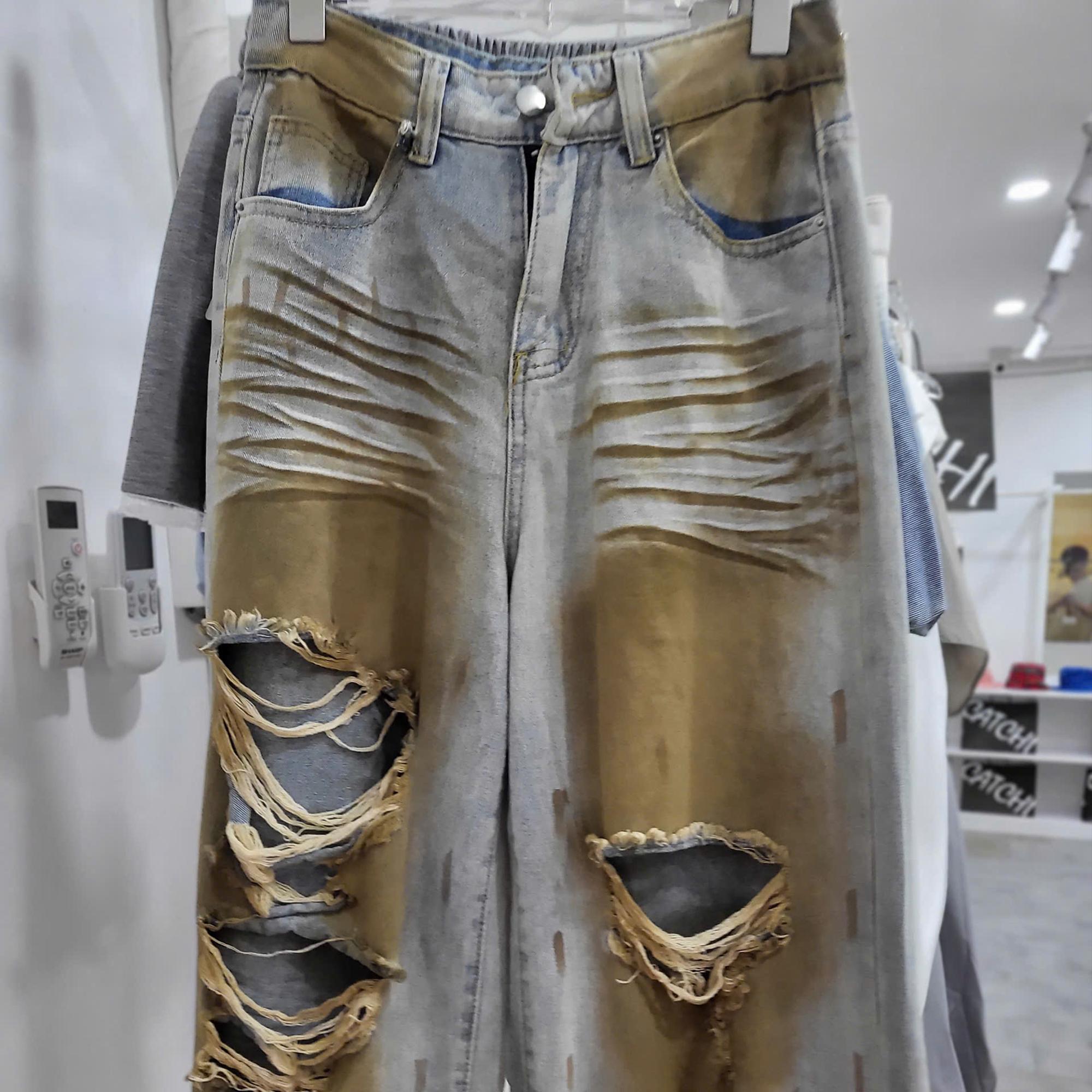 Quần jean dài rách wat màu ngà CCQD04-duoc-ban-tai-Catchi