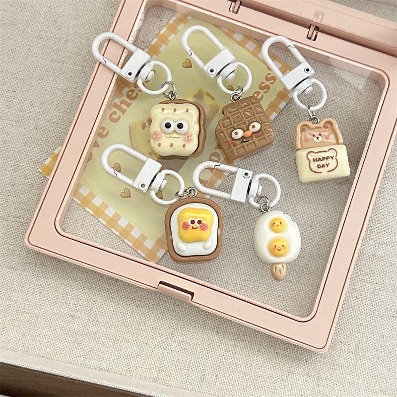 Móc khóa bánh trứng cute, mã 227
-duoc-ban-tai-Kho Sỉ Phụ Kiện Sipuki