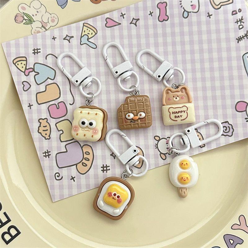 Móc khóa bánh trứng cute, mã 227
-duoc-ban-tai-Kho Sỉ Phụ Kiện Sipuki