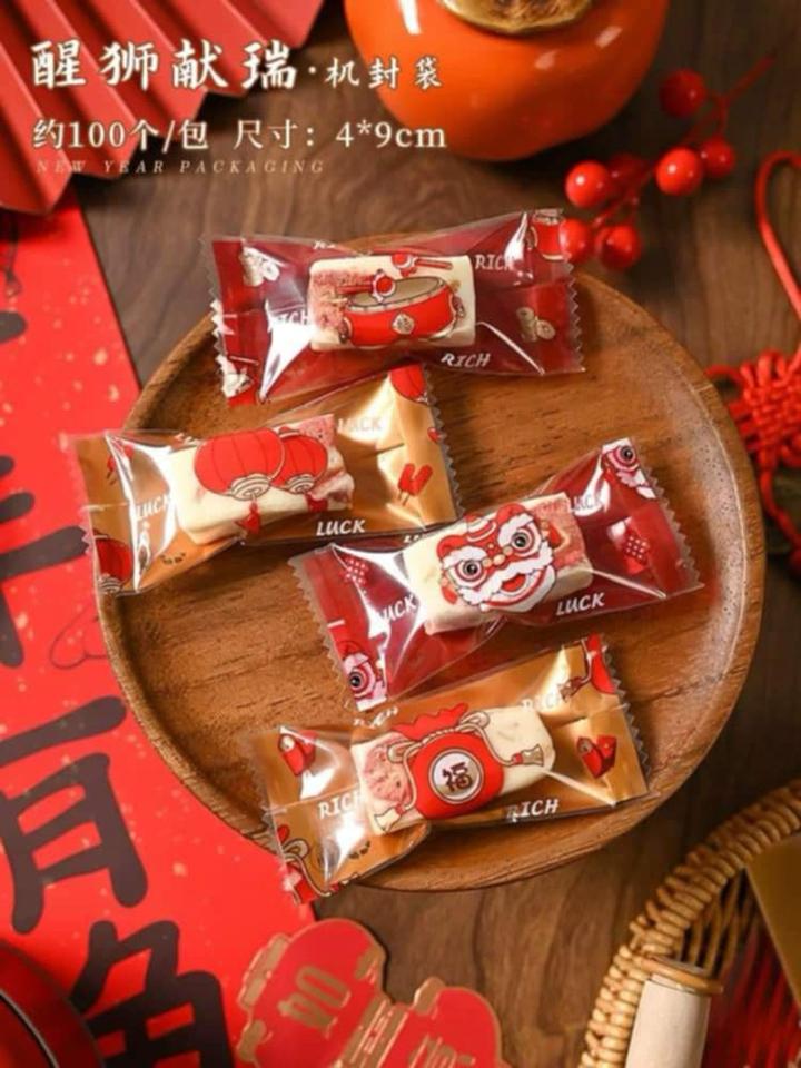 Set 100 túi đựng kẹo Lân đỏ nougat 4x9cm-duoc-ban-tai-Thach Lan