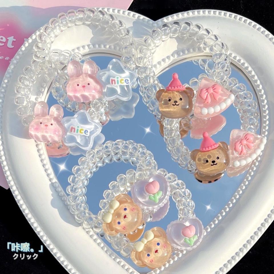 Cột tóc lò xo trong suốt 2 charm-duoc-ban-tai-Sin Sin Shop