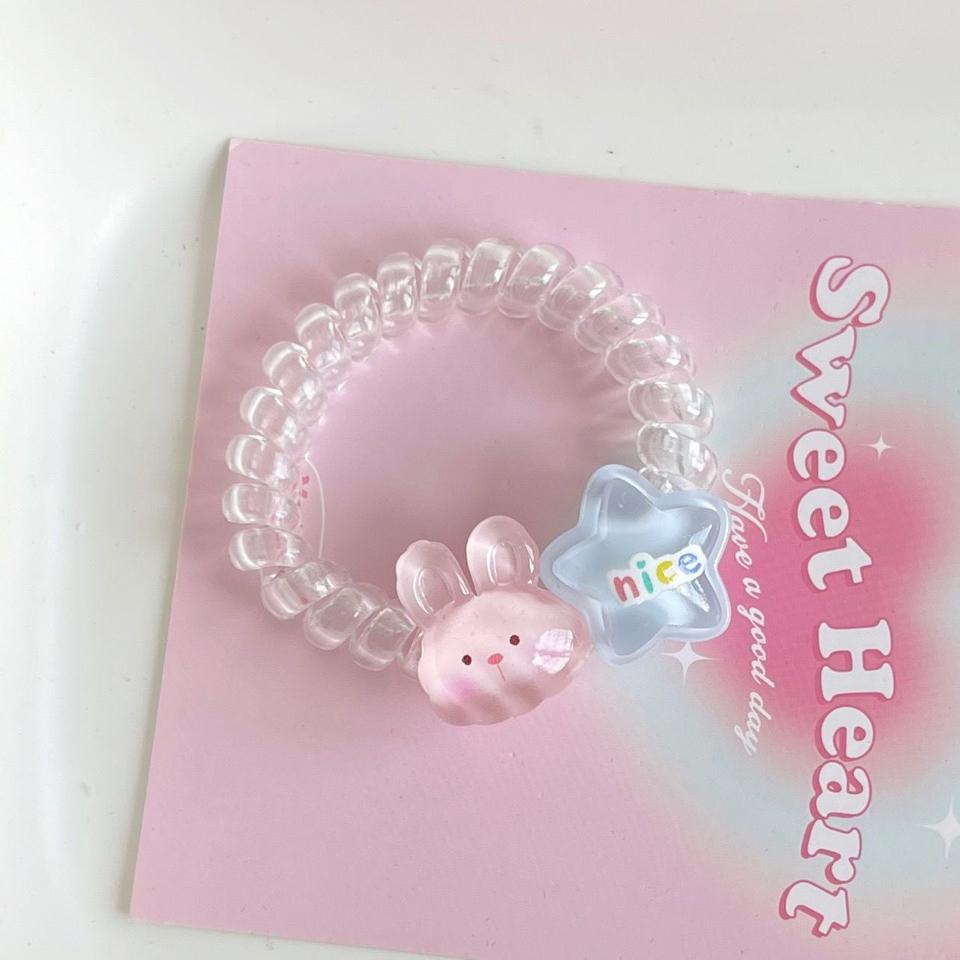 Cột tóc lò xo trong suốt 2 charm-duoc-ban-tai-Sin Sin Shop