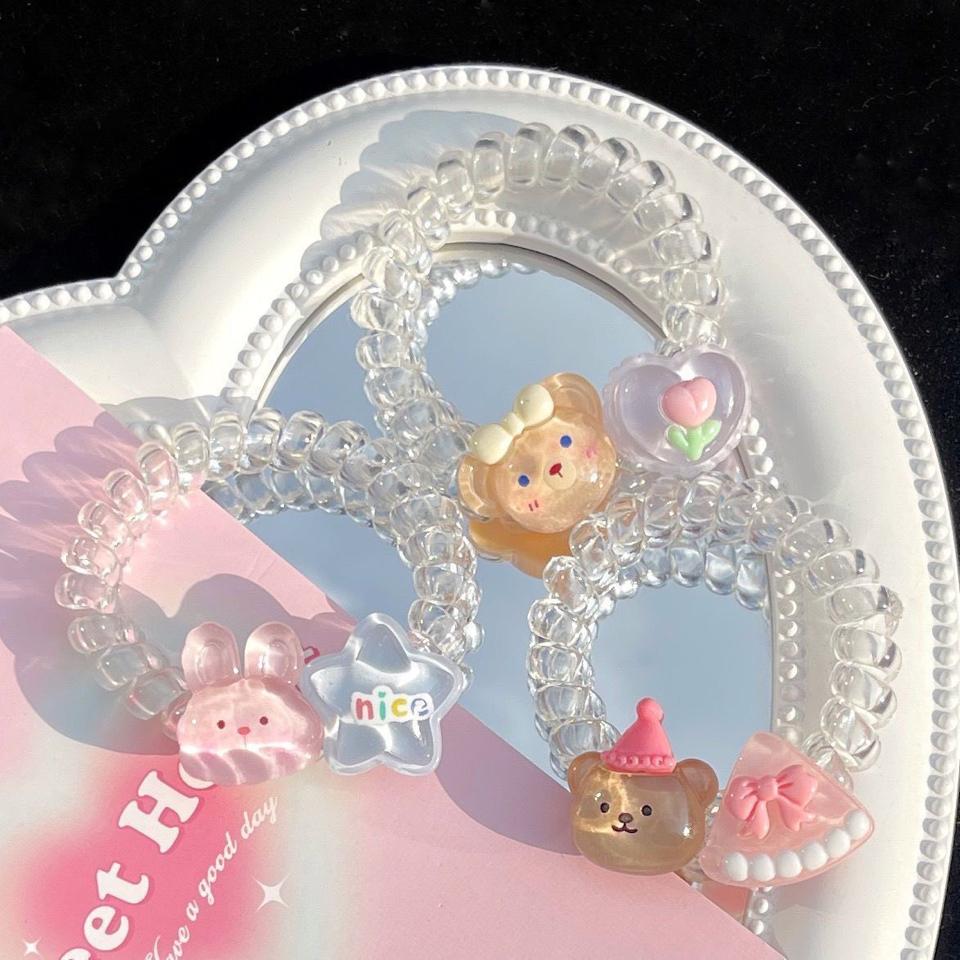 Cột tóc lò xo trong suốt 2 charm-duoc-ban-tai-Sin Sin Shop