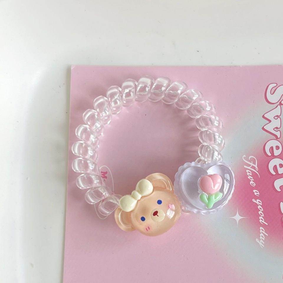 Cột tóc lò xo trong suốt 2 charm-duoc-ban-tai-Sin Sin Shop