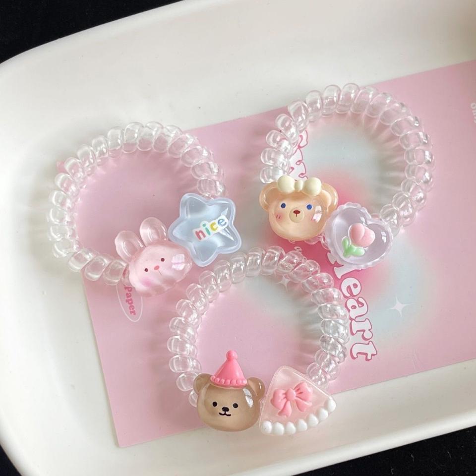 Cột tóc lò xo trong suốt 2 charm-duoc-ban-tai-Sin Sin Shop