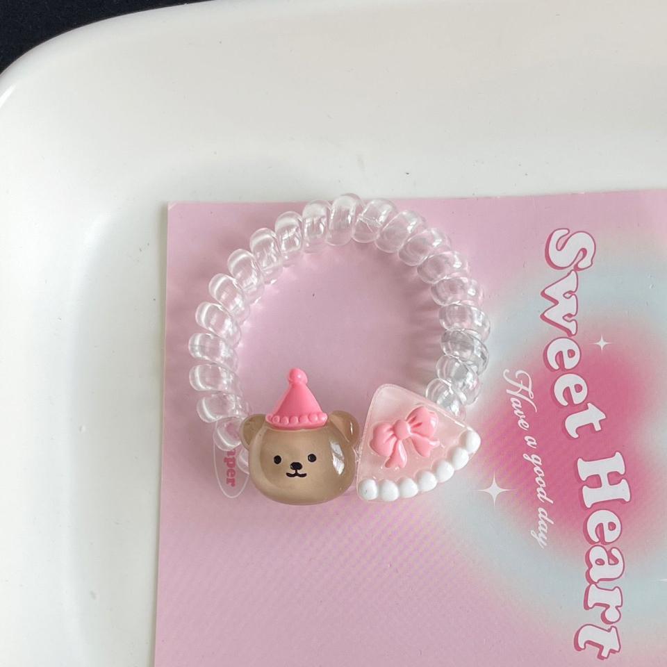 Cột tóc lò xo trong suốt 2 charm-duoc-ban-tai-Sin Sin Shop