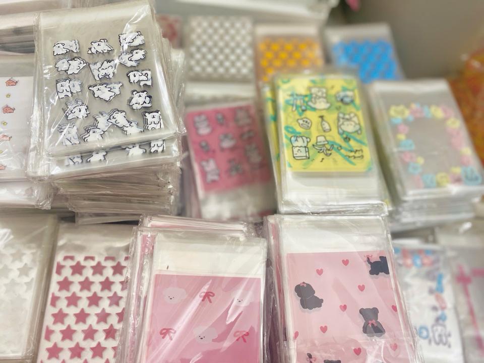 TÚI NILONG DÁN XẤP 50c HOẠT HÌNH CUTE-duoc-ban-tai-Sin Sin Shop