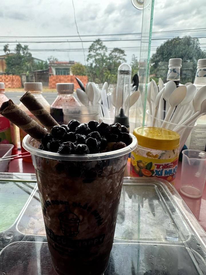 Milo dầm trân trâu đen-duoc-ban-tai-Trà sữa Happy