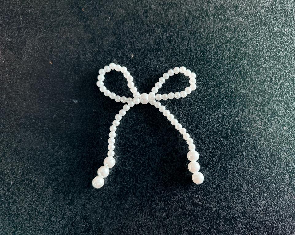 Nơ hạt trai-duoc-ban-tai-Phạm Thuỳ Linh