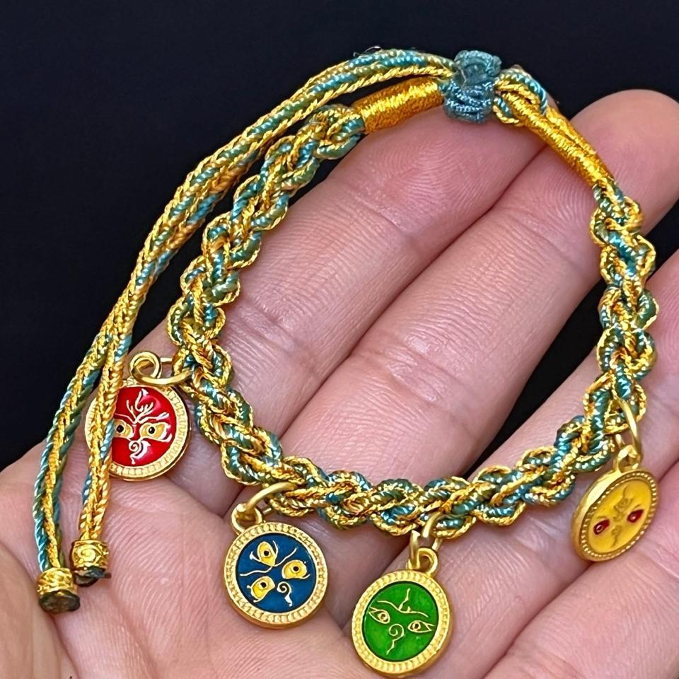 Vòng tay chỉ ngũ sắc – charm Tây Tạng Mắt Phật - Hoa Pháp Luân-duoc-ban-tai-CHANGTU