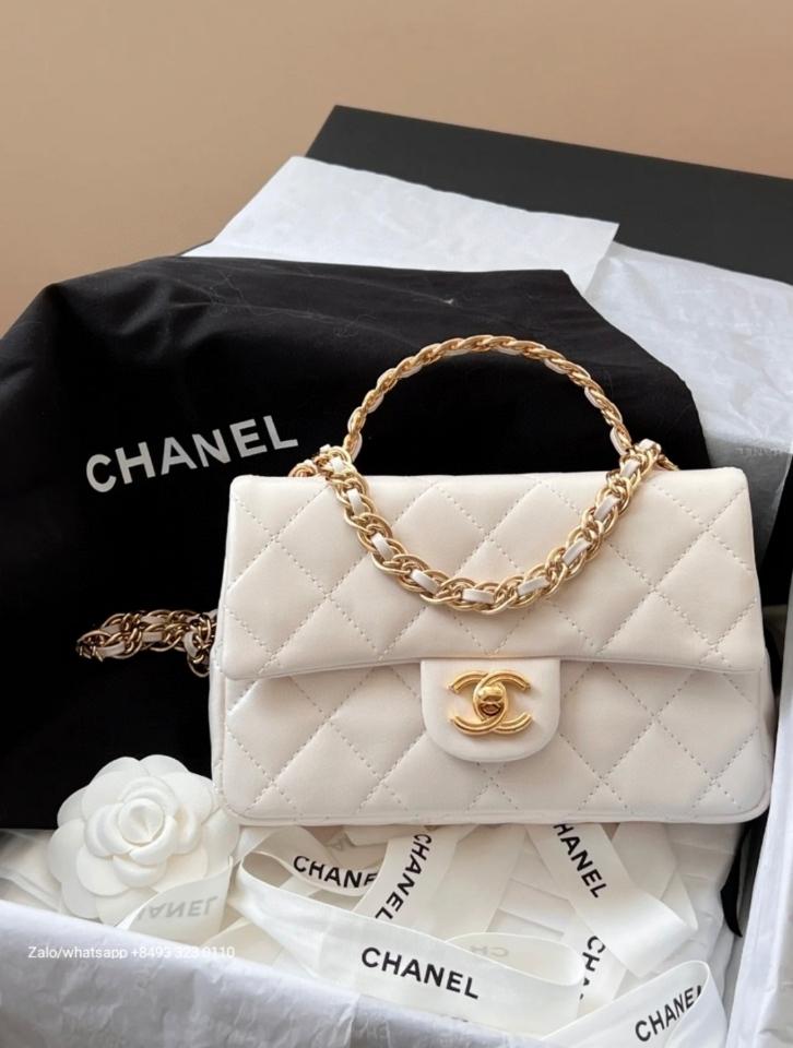 CHANEL MINI FLAP BAG WITH TOP HANDLE
Shiny Lambskin Gold-Tone Metal
White  C2 -duoc-ban-tai-Hvip Bags & Accessories