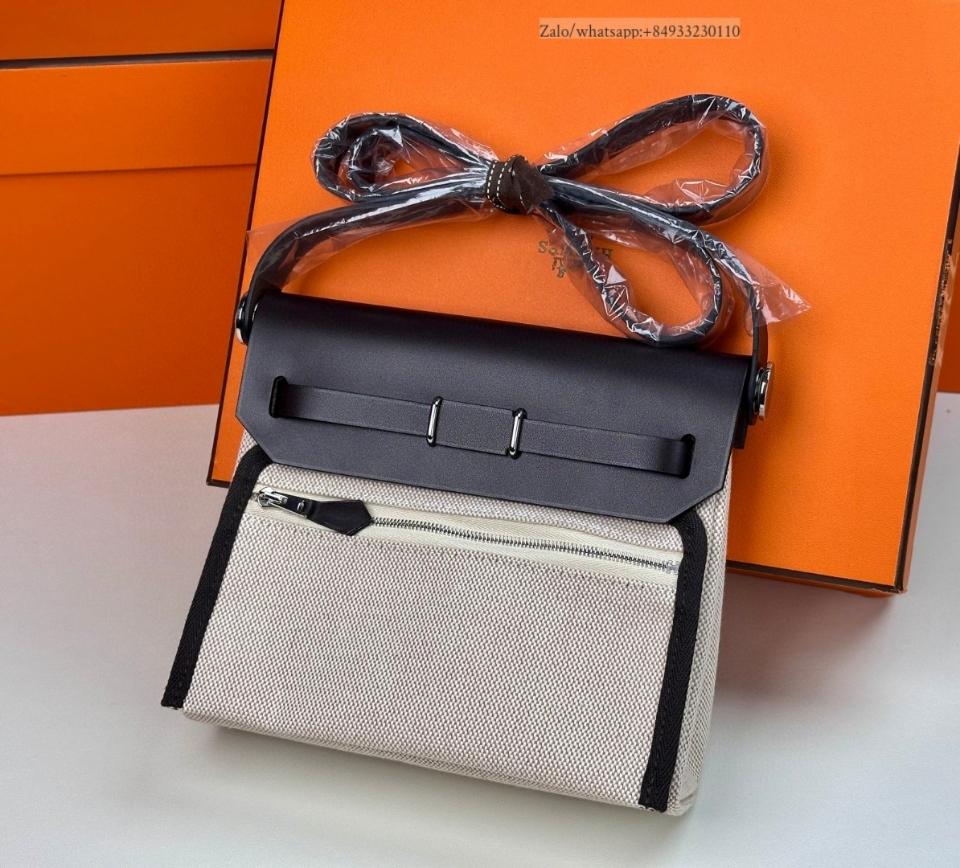 Hermès Herbag zip Mini Vache Hunter Toile Noir/Ecru PHW -duoc-ban-tai-Hvip Bags and Accessories